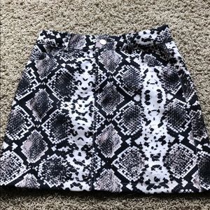 🐍 Snake Skin Mini Skirt won once